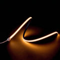Warm White 2700K LED Neon Flex 15x15mm Top Bend 24V/48V, raised-wave product view on a dark surface