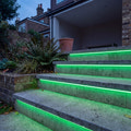 Green 15x15mm Top Bend LED neon flex in an outdoor recessed garden step lighting illustration.