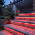 Red 15x15mm Top Bend LED neon flex in an outdoor recessed garden step lighting illustration.