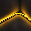 ATOM LED 8×16mm 220–240V golden neon flex illuminating a curved inside corner