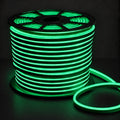 8×16mm 220–240V green IP65 neon flex lit reel on dark charcoal background