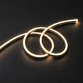 ATOM LED warm 2900k 8×16mm 220–240V neon flex in a double-loop arrangement on dark charcoal