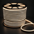 8×16mm 220–240V warm 2900k IP65 neon flex lit reel on dark charcoal background