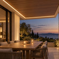 Illustrative warm 2900k 8×16mm IP65 neon flex installed under a sheltered outdoor roof