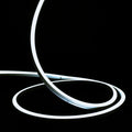 ATOM LED cool white 6000K 10x10mm side bend neon flex turning a 90° corner around an outdoor garden patio — 48V IP67 waterproof