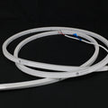 ATOM LED cool white 6000K 10x10mm side bend neon flex running along an outdoor step edge at dusk — 48V IP67 waterproof
