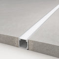 LED floor profile recessed into a floor slab with cover sitting flush