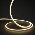 3000K horizontal-bend neon flex raised strand and loops on dark charcoal with soft surface illumination; colour-adjusted product photograph