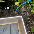 6000K neon flex light along a timber garden edge; colour-adjusted installation illustration