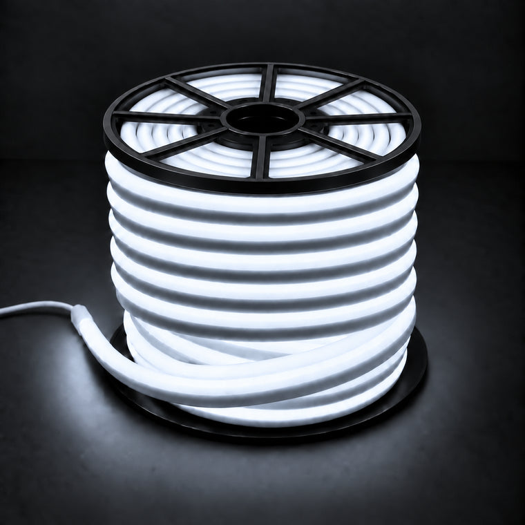 Cool white 6000K 8×16mm 220–240V wireless IP65 LED neon flex lit reel with open-spoke black top, visible light inside, end cap and cable on dark charcoal