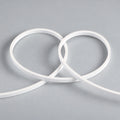 ATOM LED — FreeCut mini neon flex 4x8mm unlit white silicone LED strip showing flexible loops