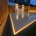 Cool White 6000K 10x20mm 48V IP67 LED neon flex lighting a patio edge at dusk — ATOM LED