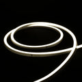 ATOM LED natural white 4000K 10x10mm side bend neon flex bending flat around an outdoor flower border — 48V IP67 waterproof
