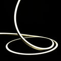 ATOM LED natural white 4000K 10x10mm side bend neon flex turning a 90° corner around an outdoor garden patio — 48V IP67 waterproof