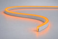 Orange 6x12mm 12V IP65 neon flex showing the domed side-bend profile used in the product datasheet.