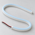 Generated illustration of unlit Ice Blue 6x12mm neon flex with a domed tinted top, white silicone sides and rounded end caps