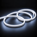 6x12mm LED neon flex with Cool White 6000K illumination in overlapping loops on a dark charcoal surface.