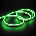 6x12mm LED neon flex with Green illumination in overlapping loops on a dark charcoal surface.