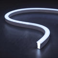 RGB neon flex showing an icy cool white RGB mix with a blue tint and matching glow on a dark charcoal surface