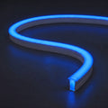 RGB neon flex with solid blue illumination and matching glow on a dark charcoal surface