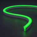 RGB neon flex with solid green illumination and matching glow on a dark charcoal surface