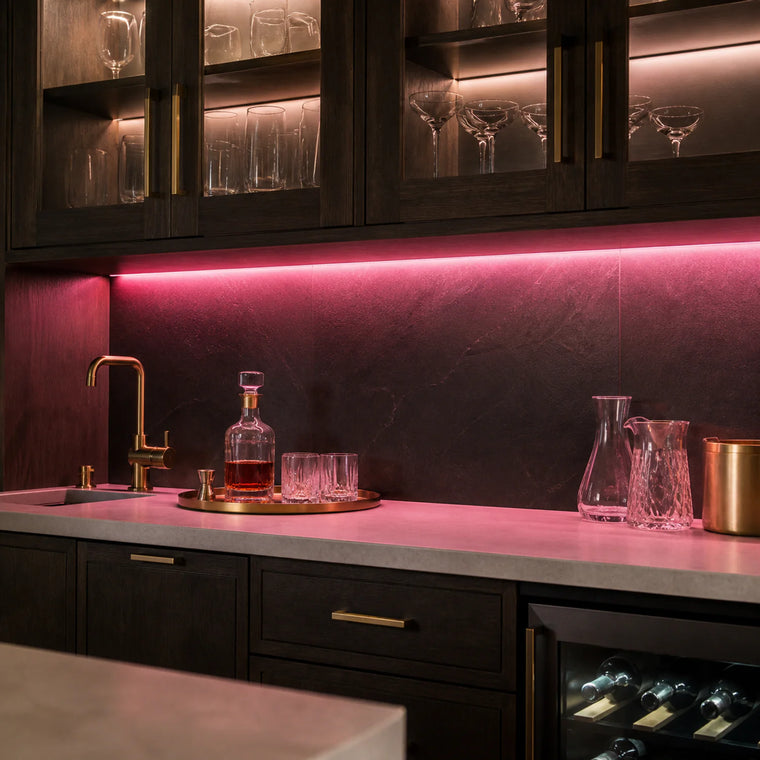 Pink kitchen cabinet SCOB LED strip installed in a modern dry bar — illustrative interior