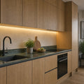 2700K precision under cabinet COB LED strip installed in a modern kitchen — illustrative interior