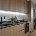 6500K precision under cabinet COB LED strip installed in a modern kitchen — illustrative interior