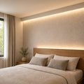 Illustrative 3000K FreeCut COB LED strip bedroom installation with continuous concealed lighting