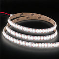 4000K 12V 240 LEDs/m LED strip with 3M backing on charcoal background