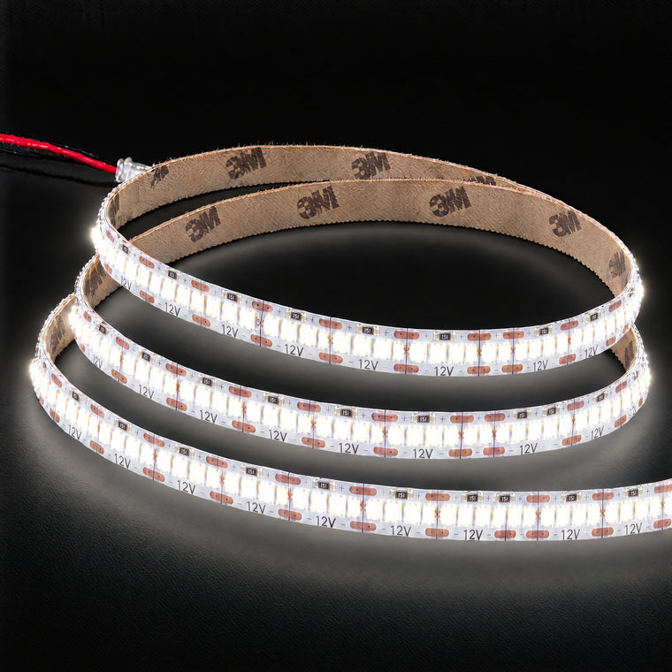 4000K 12V 240 LEDs/m LED strip with 3M backing on charcoal background