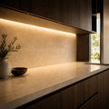 Illustrative indoor under-cabinet installation showing Warm White 2700K SCOB LED strip lighting