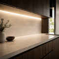 Illustrative indoor under-cabinet installation showing Warm White 3000K SCOB LED strip lighting
