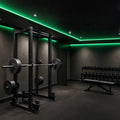 Green SCOB LED strip lighting installed in a modern gym — illustrative interior