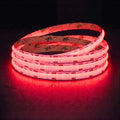 Red Special COB LED strip, 24V, 10mm wide, illuminated reel