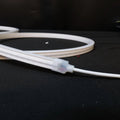 Warm White 3000K 8x16mm 24V neon flex — coiled reel showing 15m continuous run length
