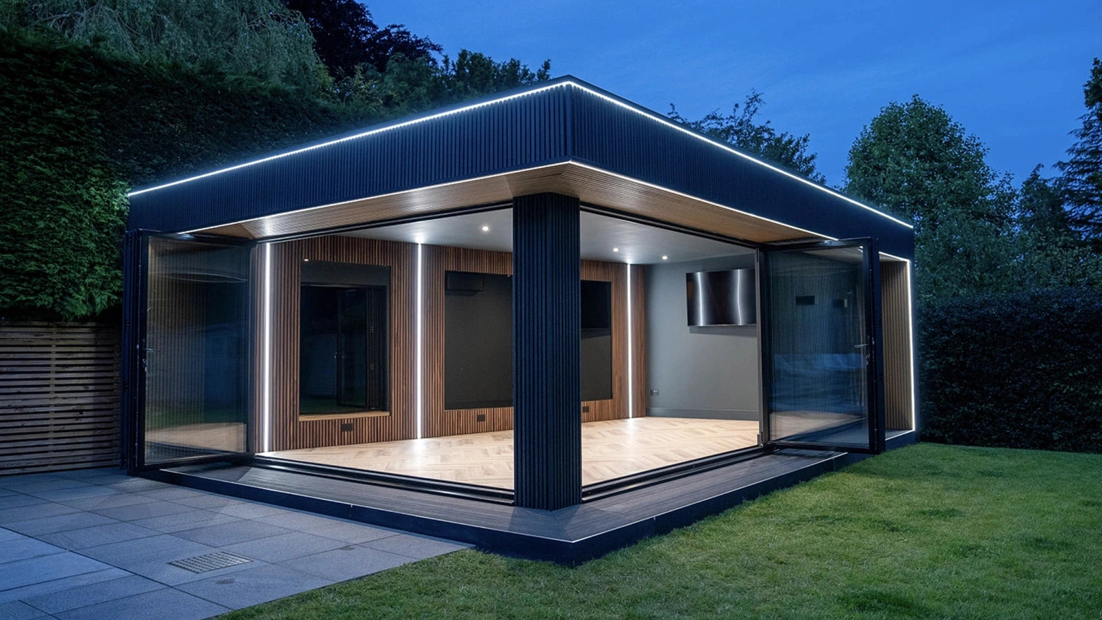 Dot-free COB strip washing the underside of a garden-room soffit after dark