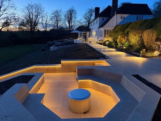 Sunken hex seating well — recessed step lighting